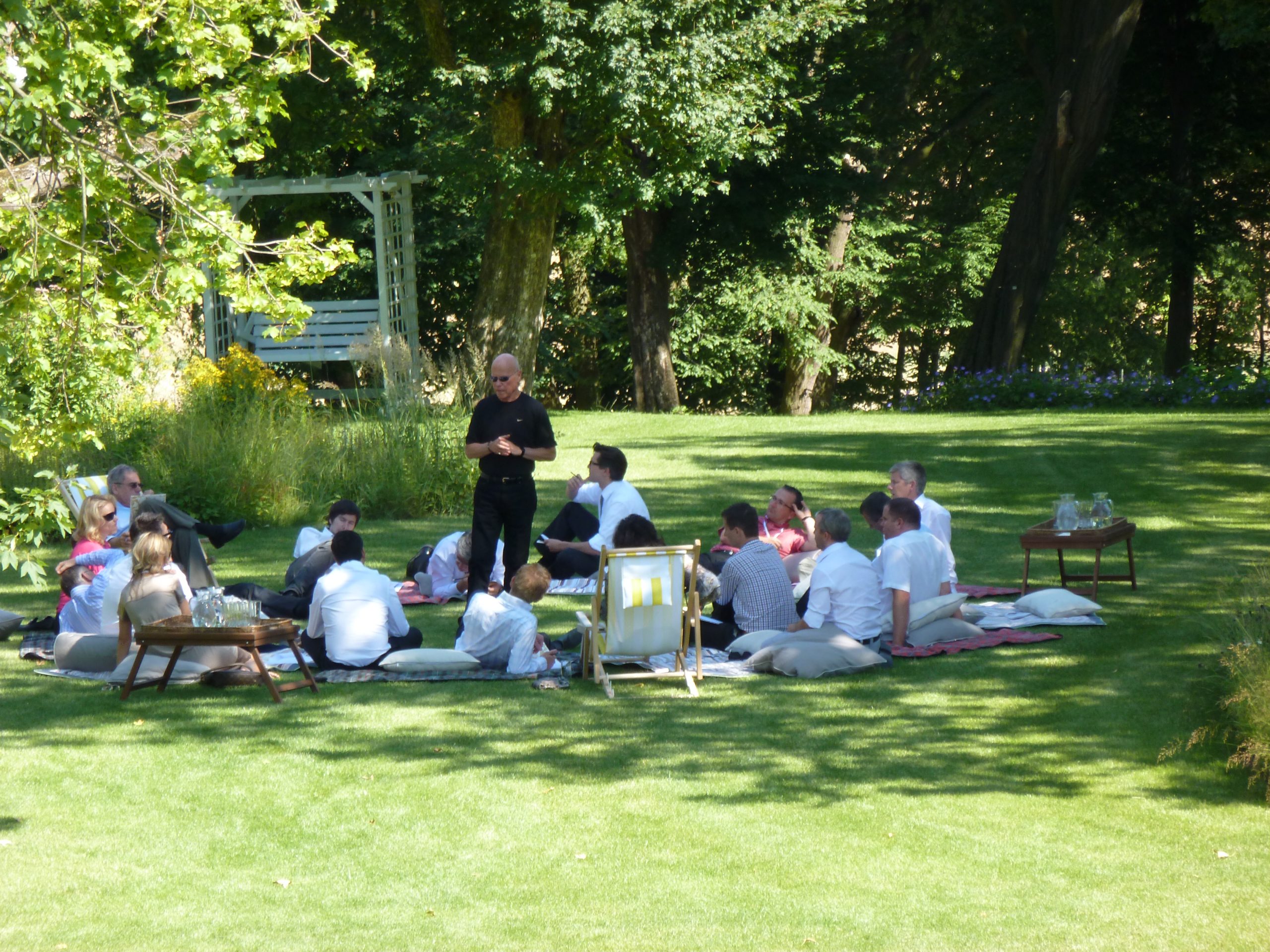 Lance teaching a group outside.