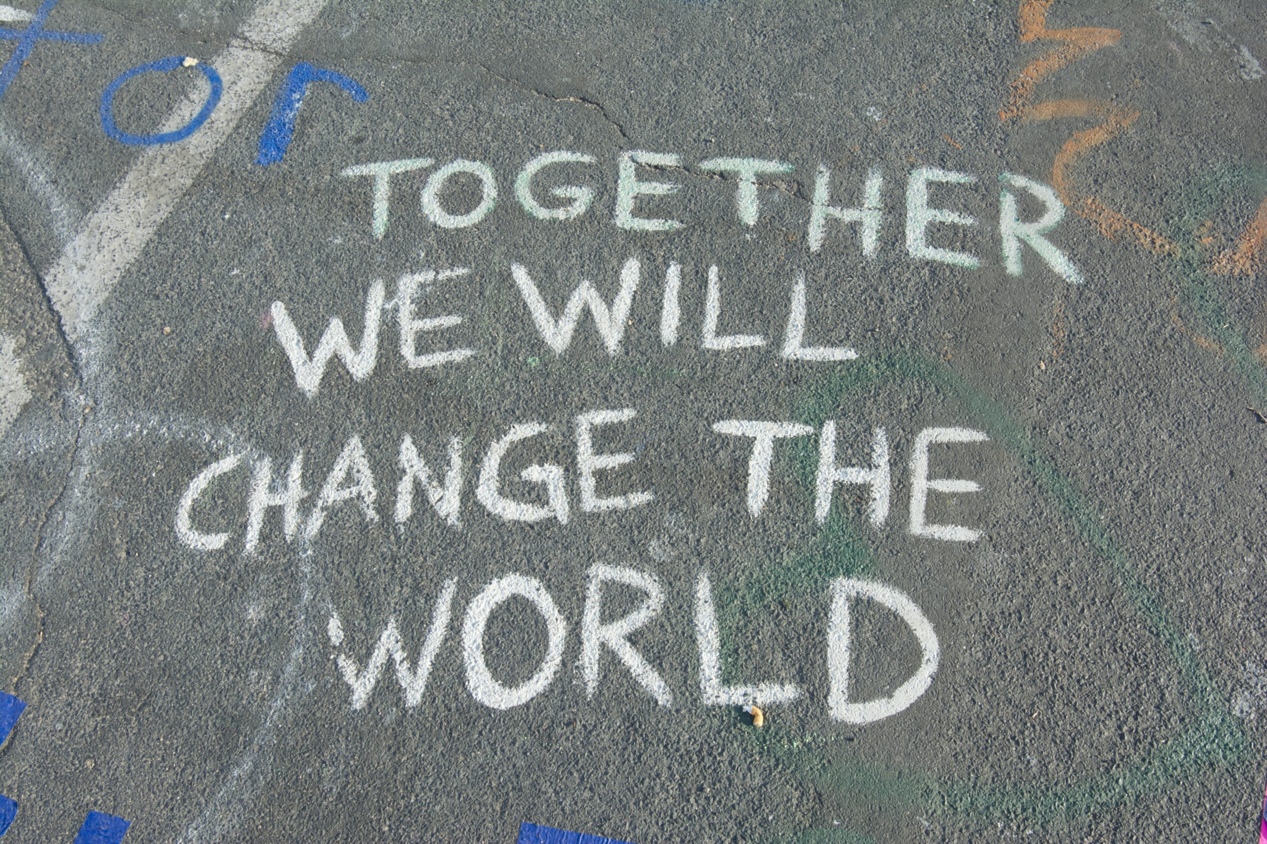 A quote that says "Together we will change the world"