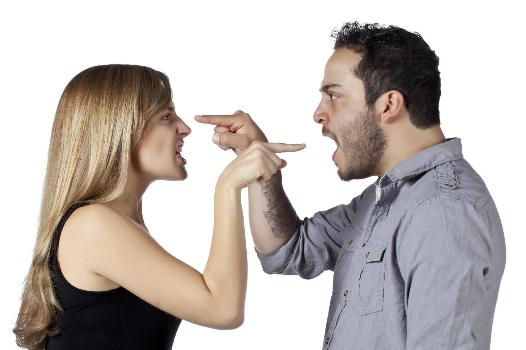 Horizontal image of an angry couple pointing a finger on each other